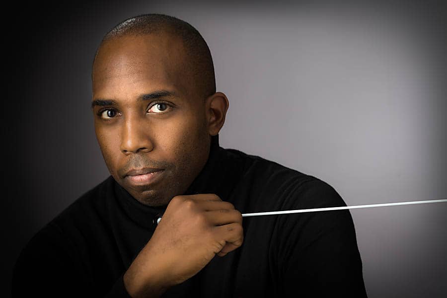 a man holding a stick