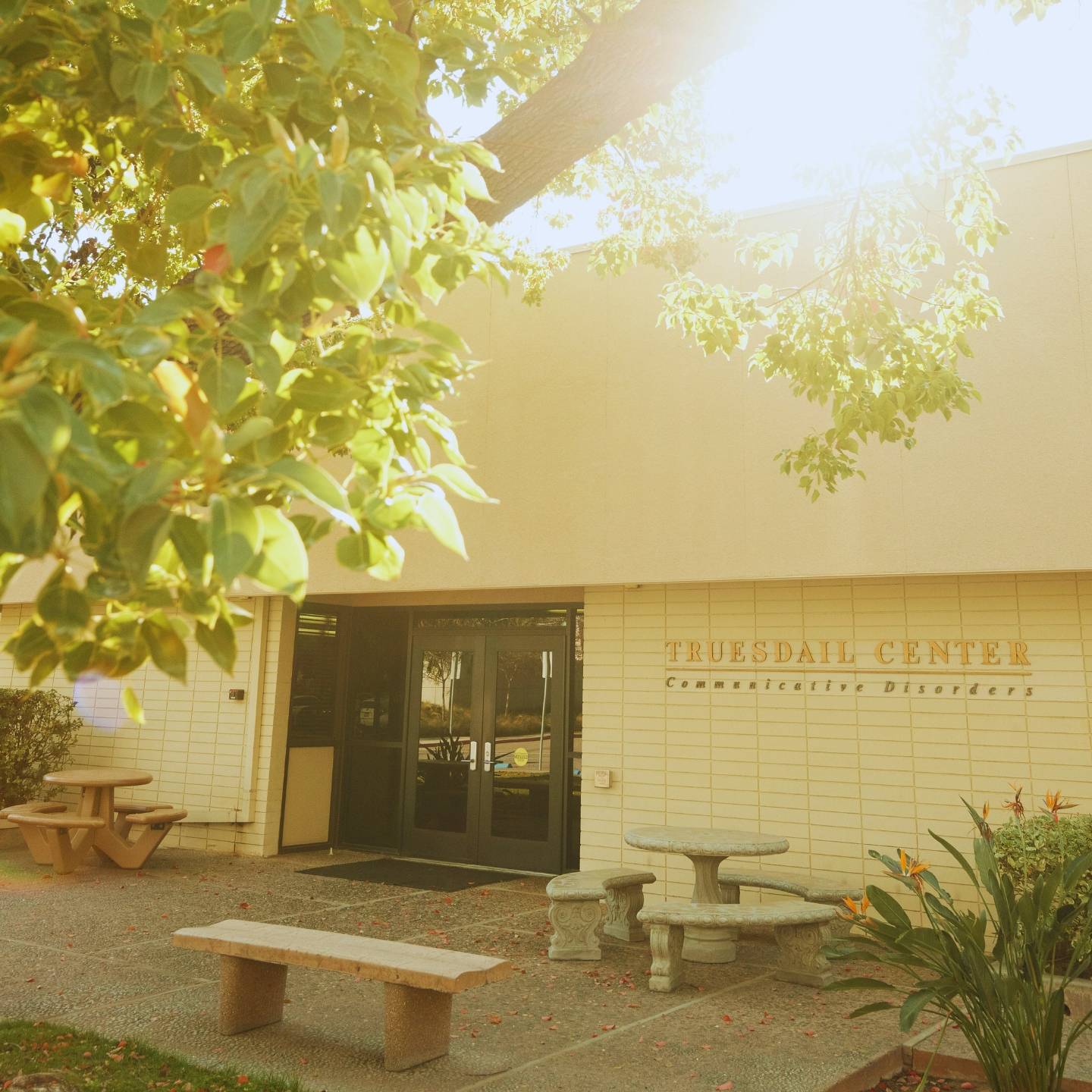 a building with benches and tables