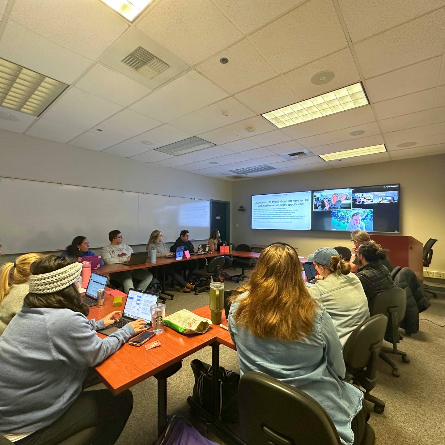 a group of people sitting in a room
