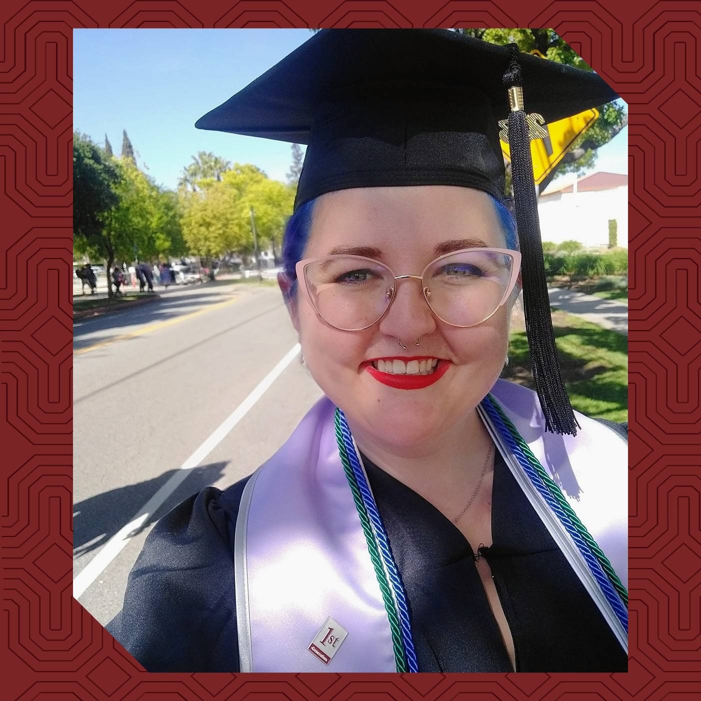 a woman wearing a graduation cap and gown