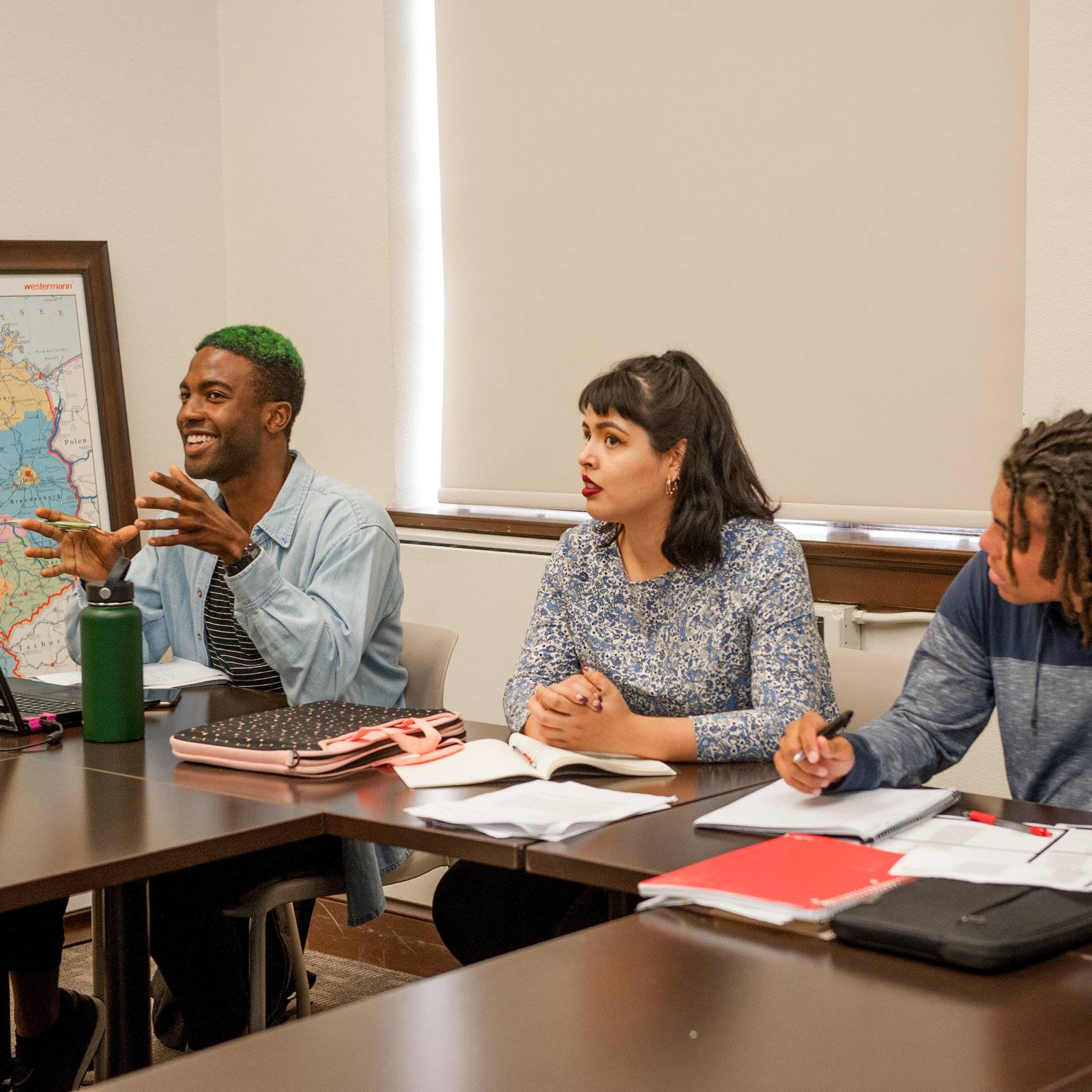 a group of people sitting at a table