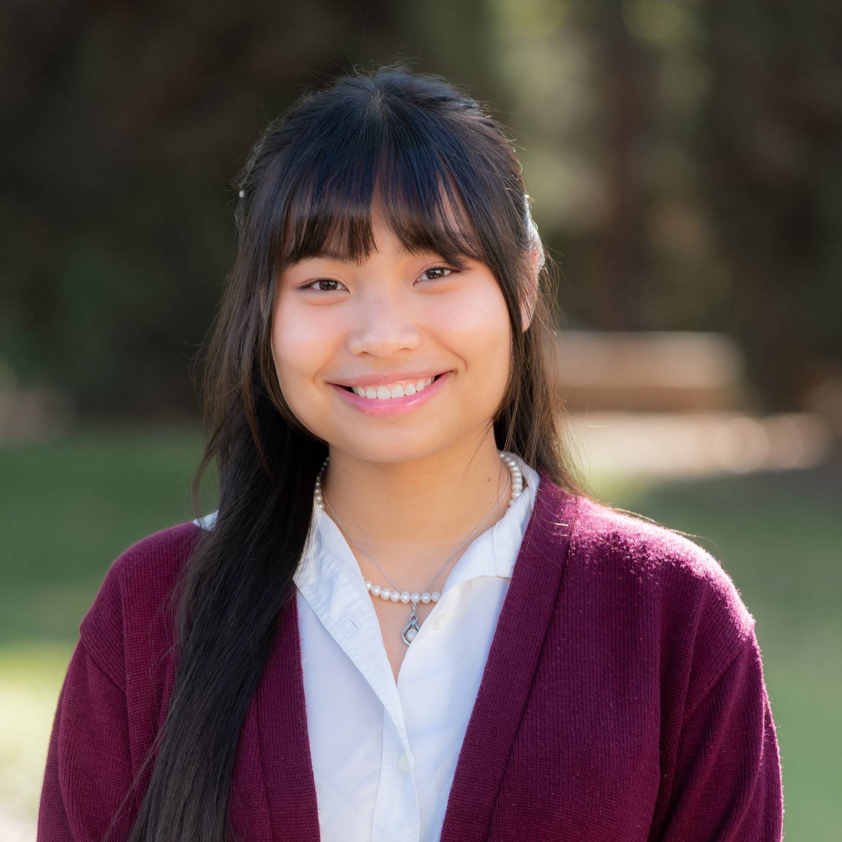 a woman smiling at camera