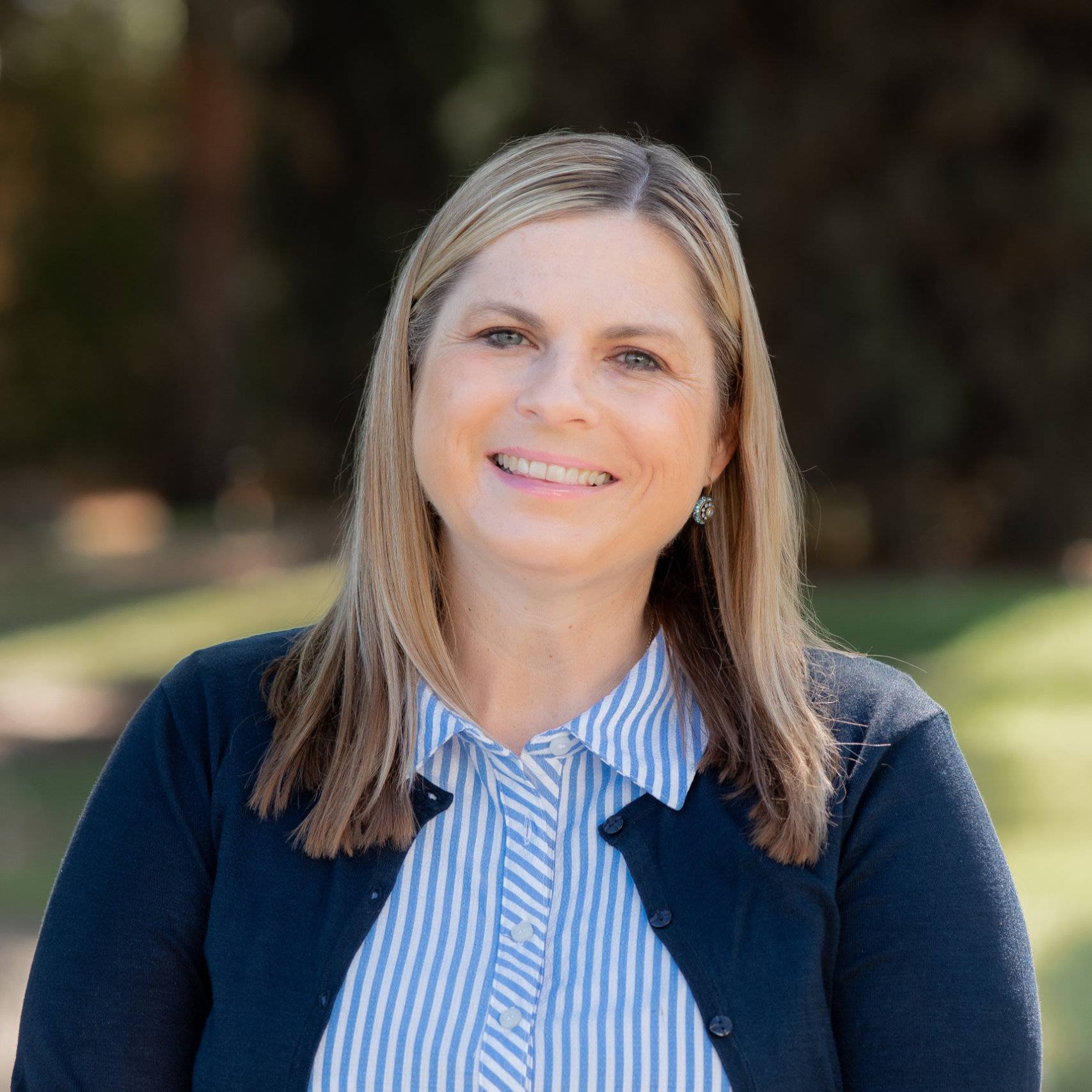 a woman smiling at camera