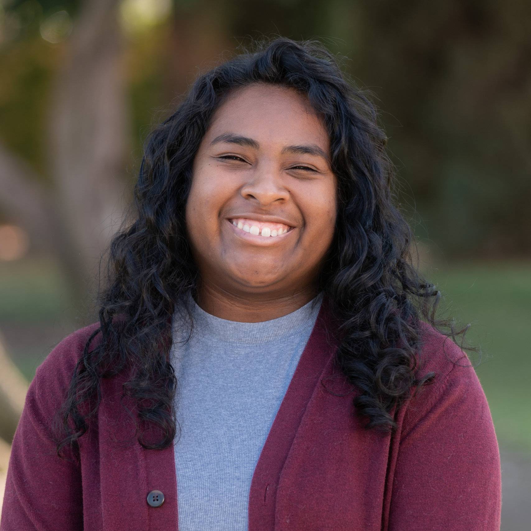 a woman smiling at camera