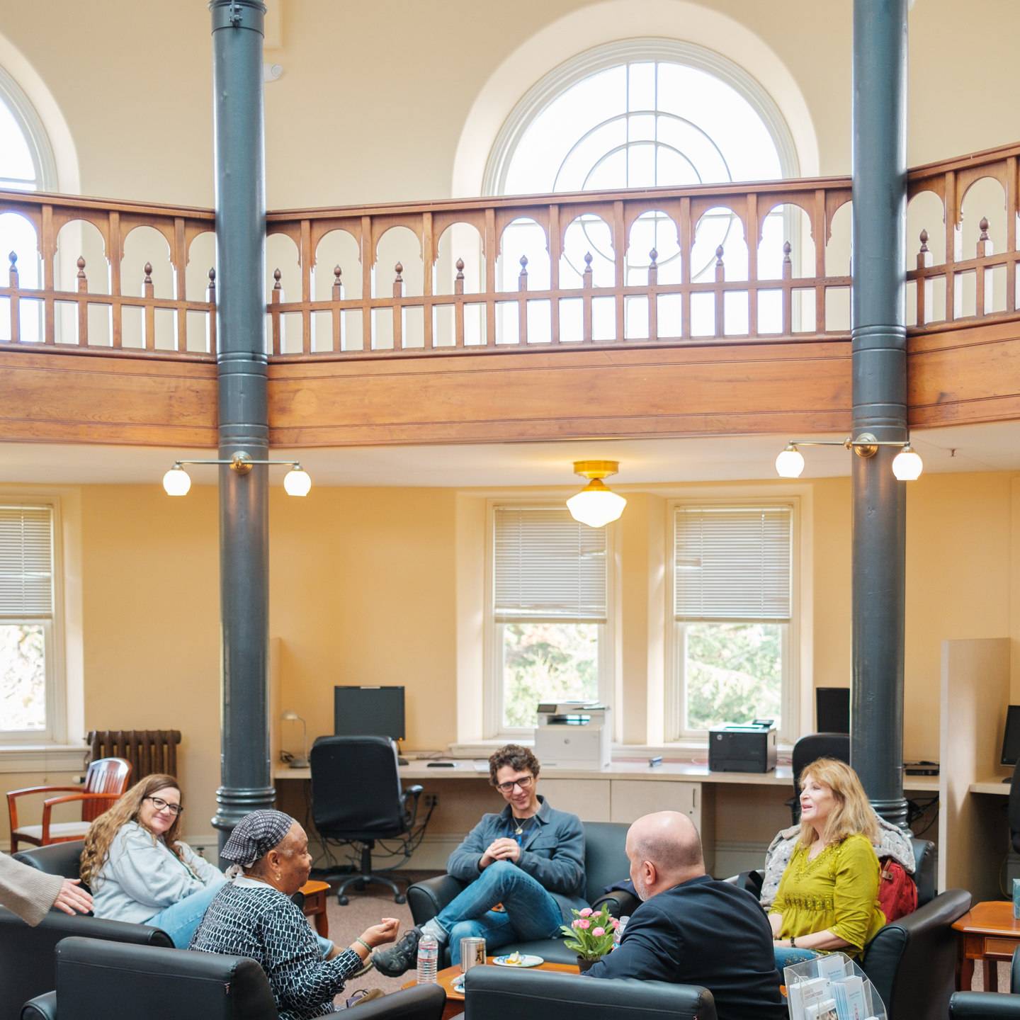 a group of people sitting in a room
