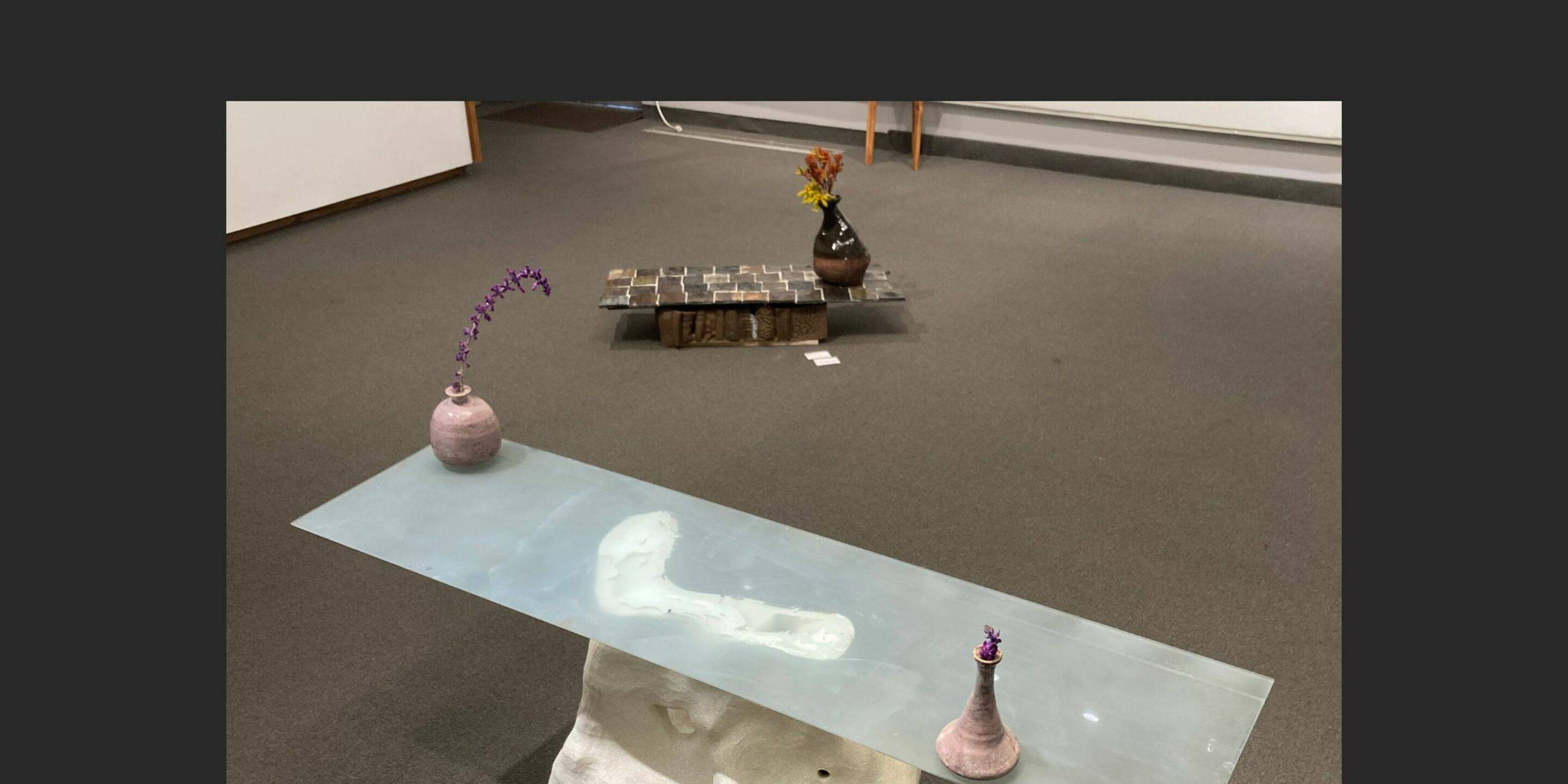 a table with vases on it