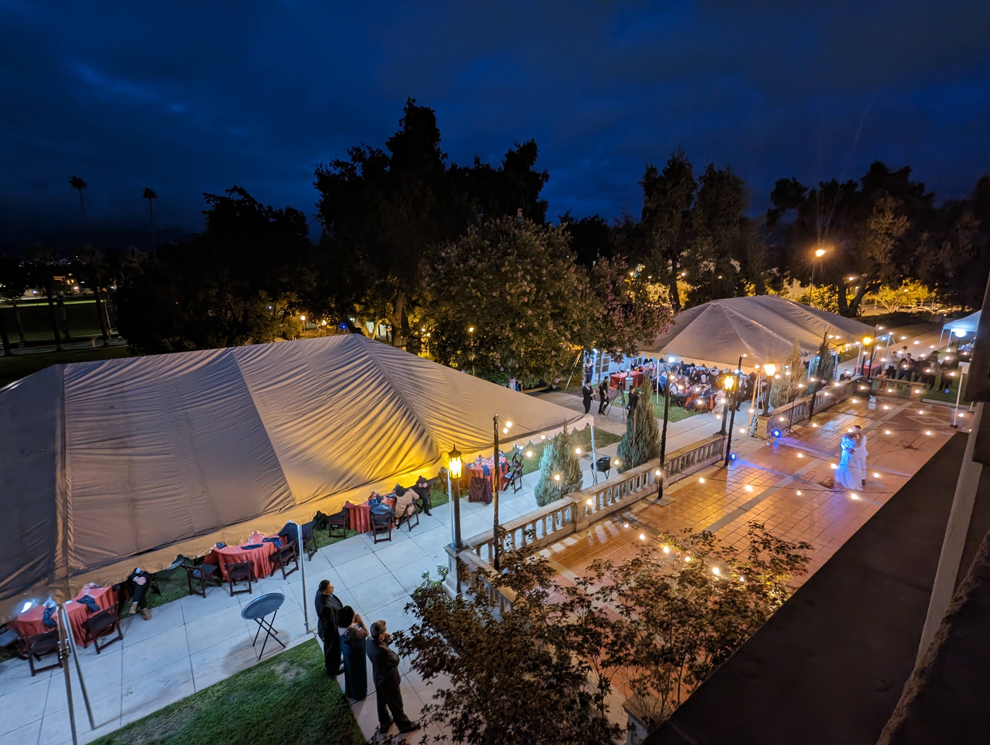 a group of people outside at night