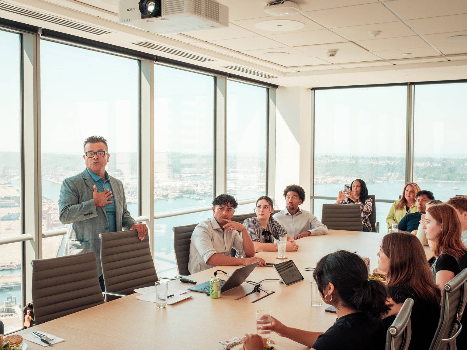 a group of people sitting around a table