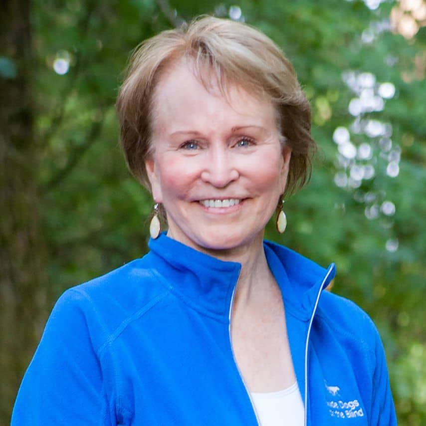 a woman in a blue jacket