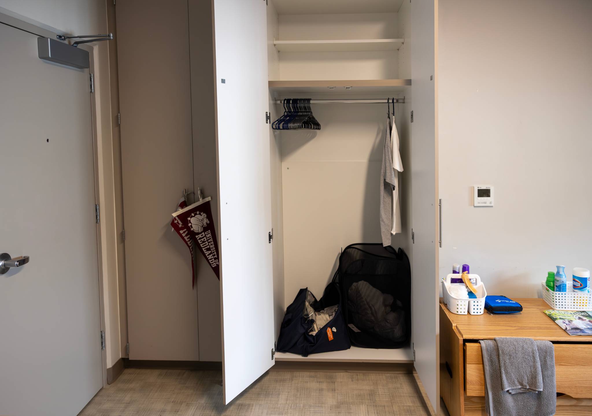 a closet with a bag and swingers