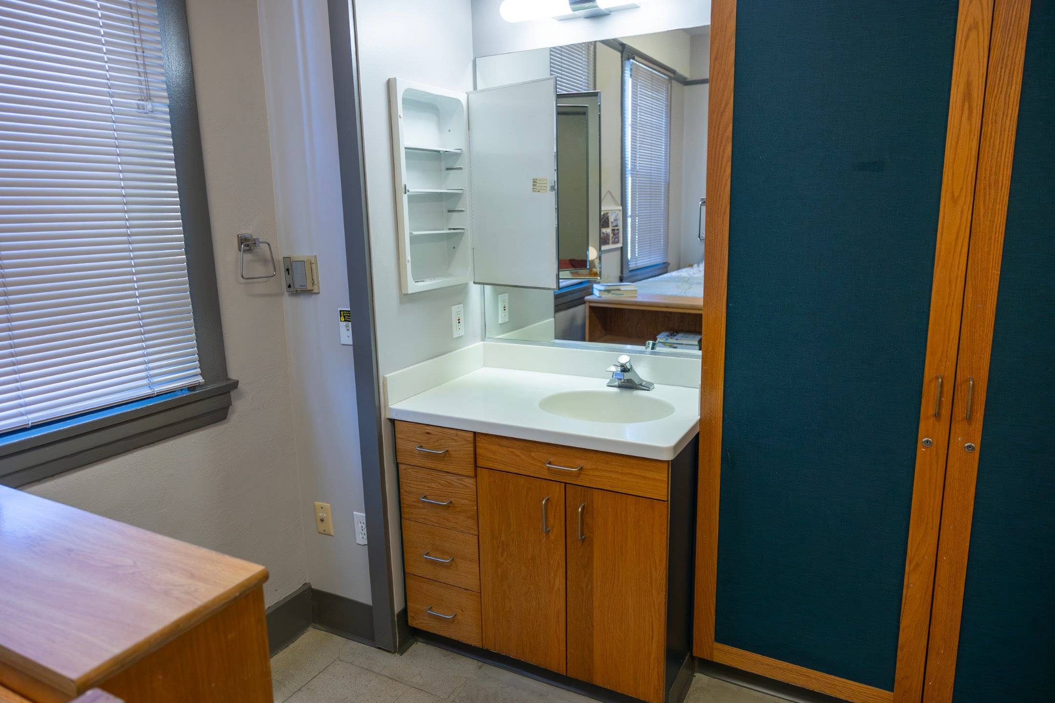 a bathroom sink with a mirror