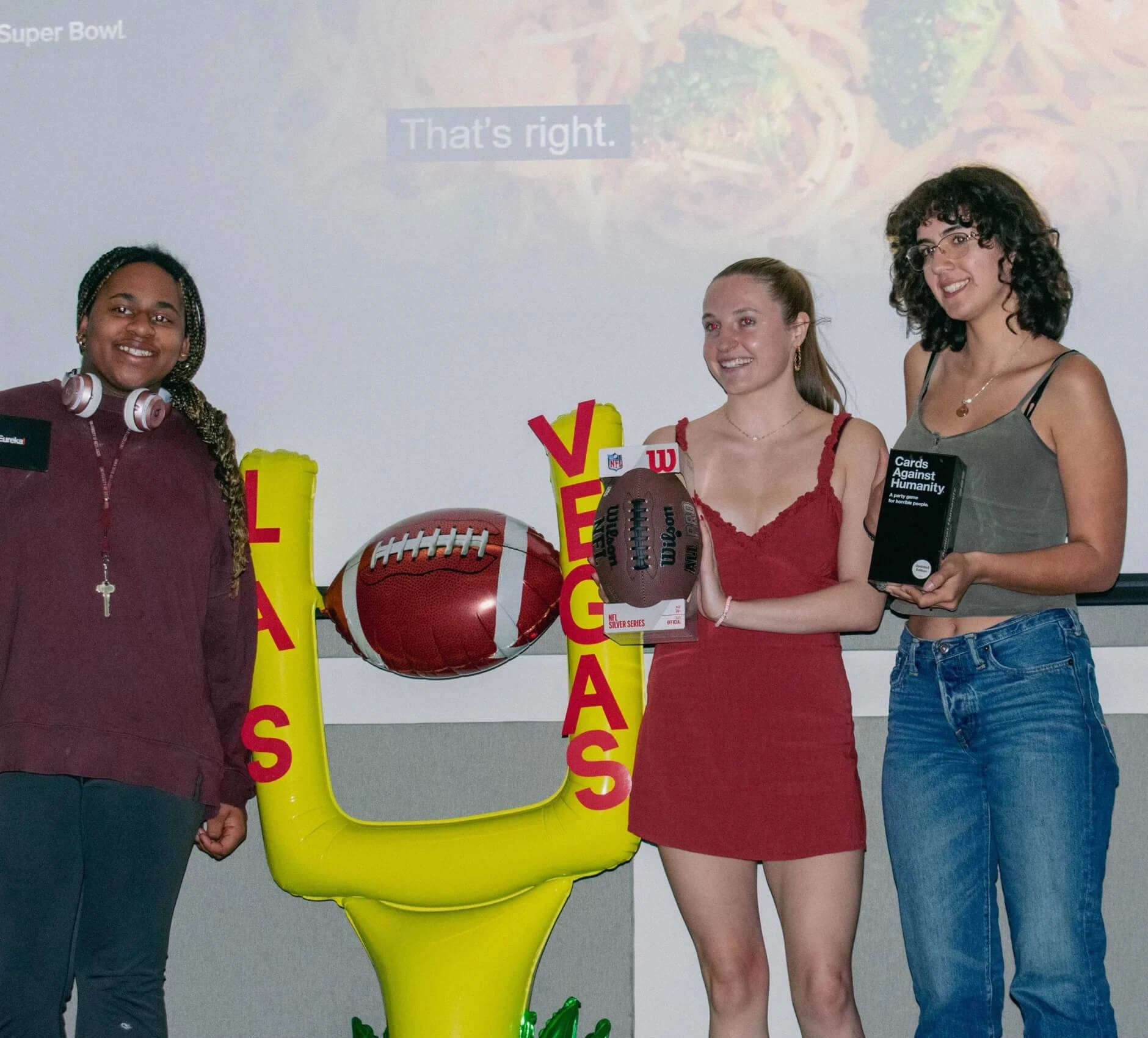 a group of women posing for a photo