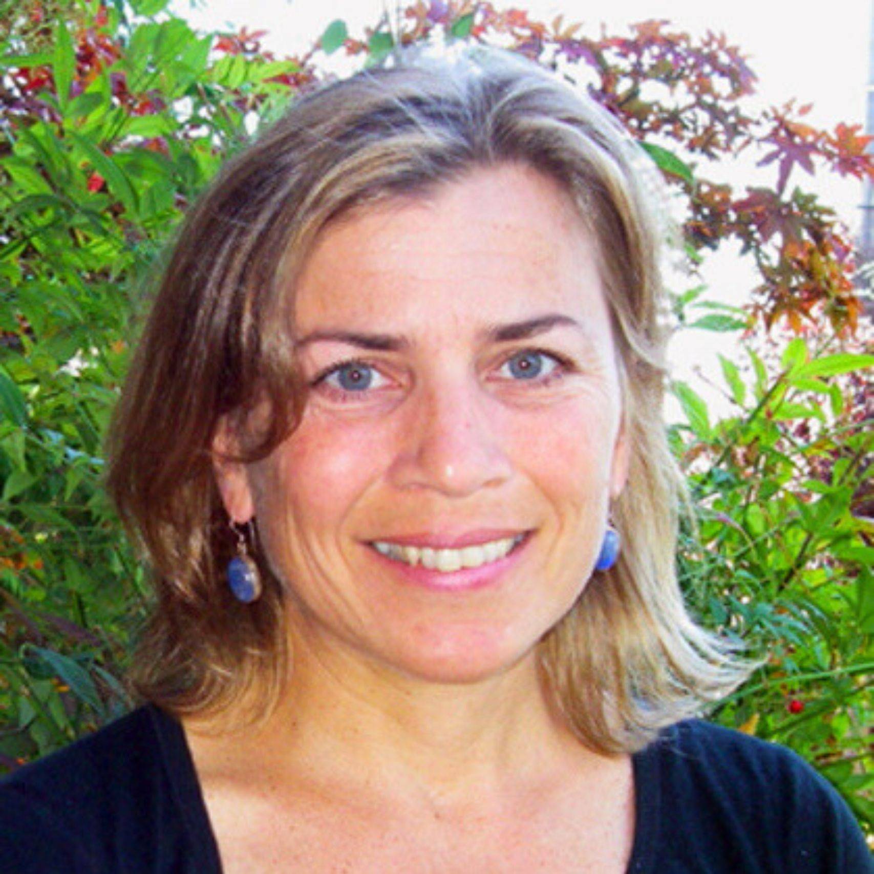 a woman smiling at camera