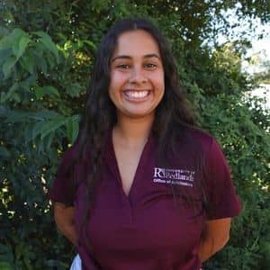 a woman smiling at camera