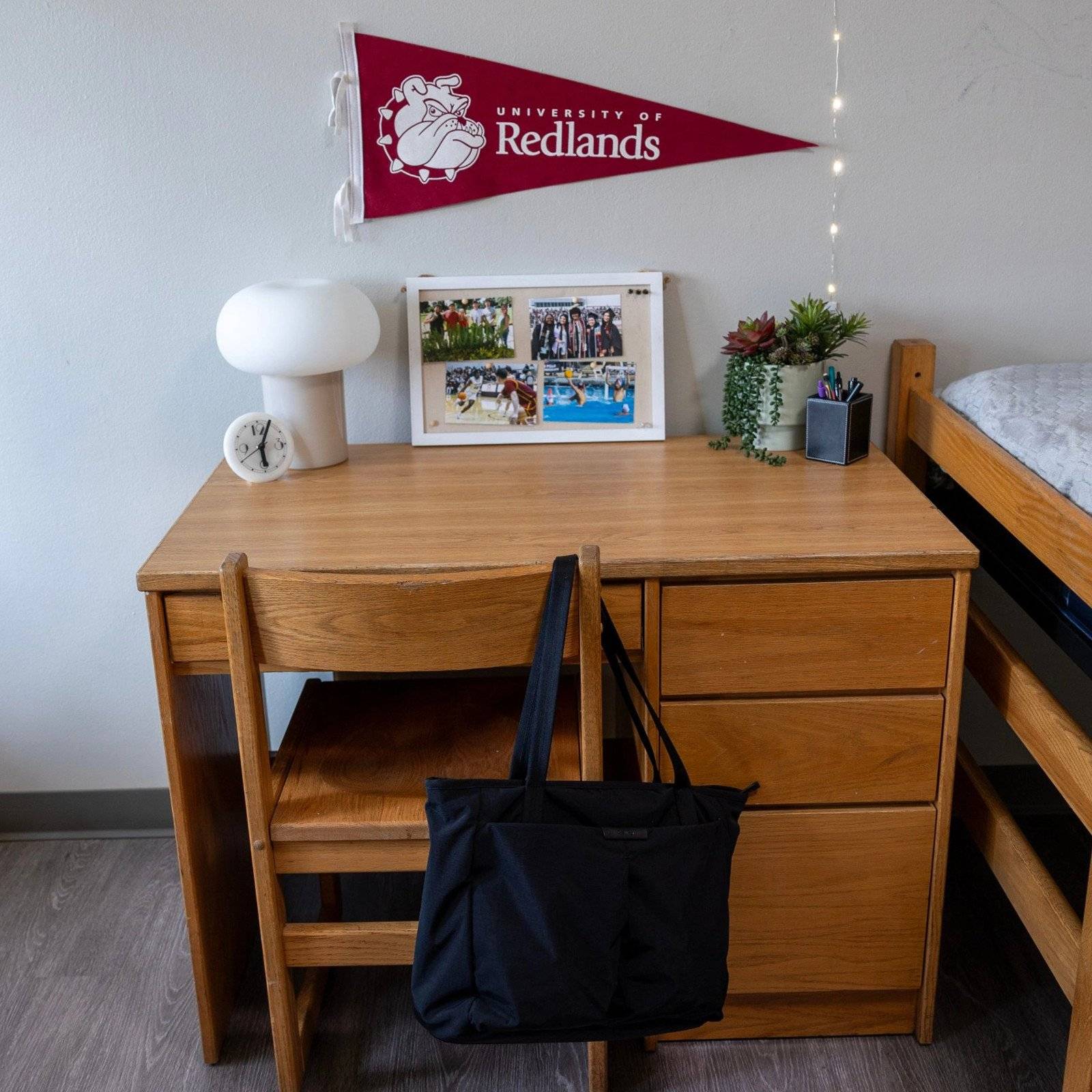 a desk with a picture and a flag