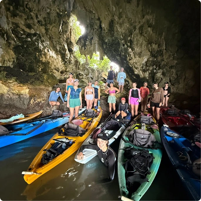a group of people in a cave