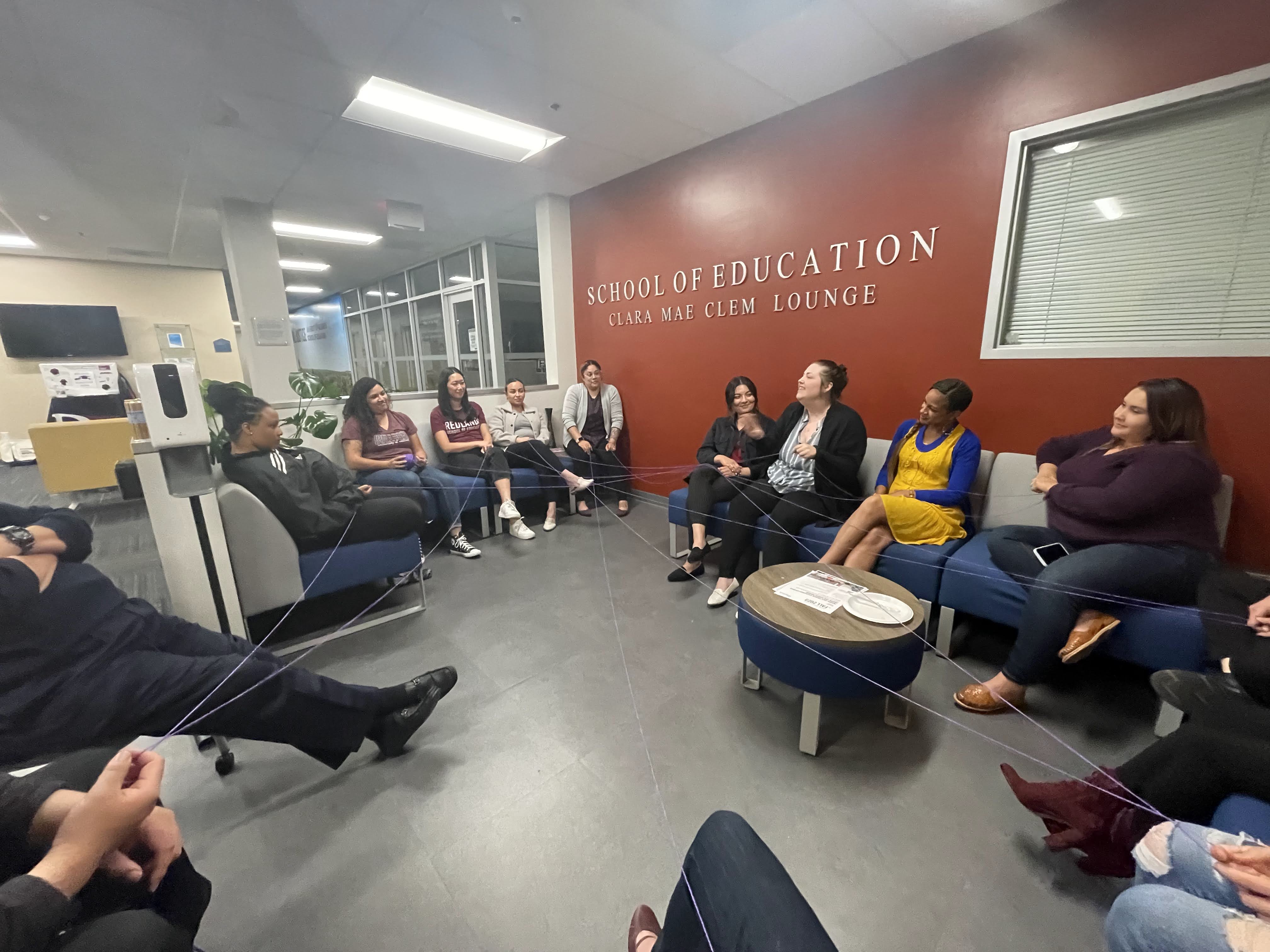 a group of people sitting in a circle